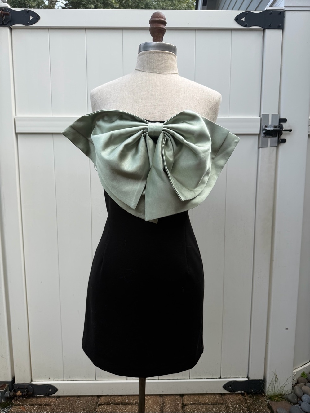 Elegant Anthropologie Black Strapless mini Dress with Sage Bow